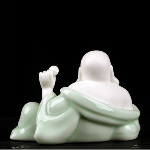 Tượng phật di lặc để xe ô tô mang lại may mắn