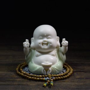 Tượng Di Lặc để xe ô tô may mắn khi đi đường