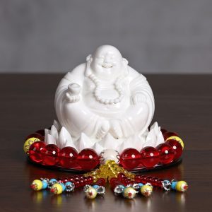 Tượng Di Lặc tọa đài sen để oto mang lại may mắn