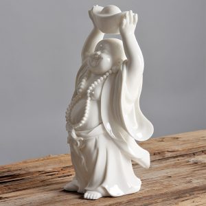 Tượng Phật Di Lặc may mắn để taplo