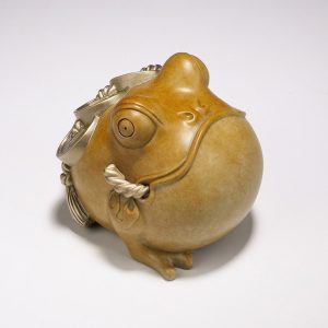 Cóc thiềm thừ trên bàn thờ thần tài